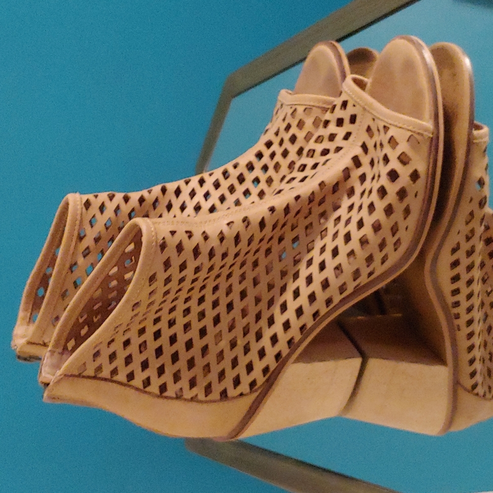 Cutout leather ankle booties